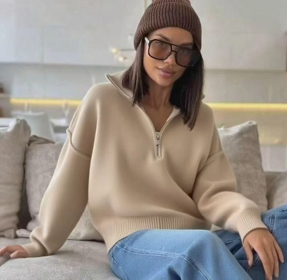 Women's knit sweater with stand-up collar and zipper