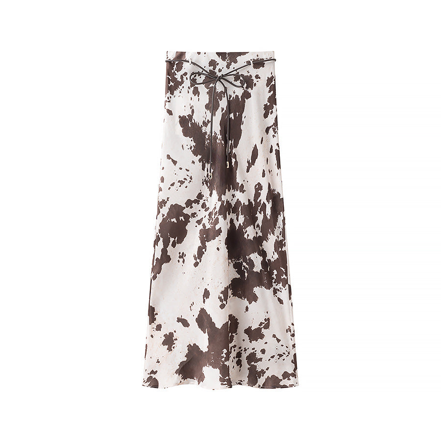 Women's loosely cut shirt blouse with cow spot print and concealed button placket Shop Velvia