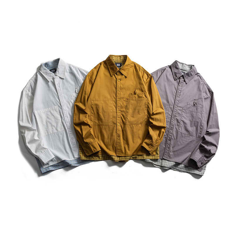 Men's layered look overshirt with patch front pockets, loose fit and checked underlay Shop Velvia