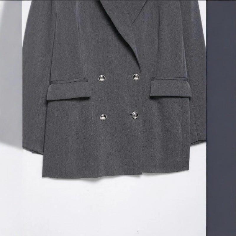 Women's oversized structured double-breasted blazer with wide lapels and patch pockets Shop Velvia