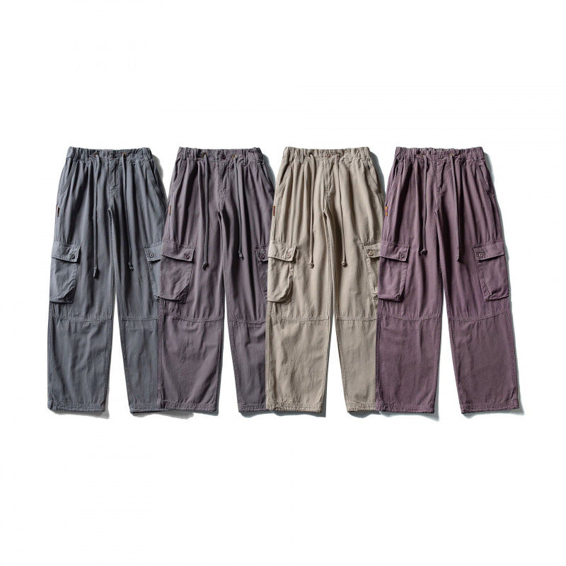 Men's cargo pants with wide leg, elastic drawstring waistband, and patch flap pockets Shop Velvia
