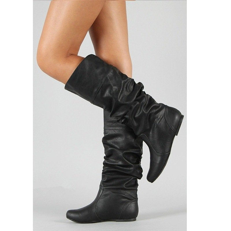 Women’s casual knee-high slouch boots with flexible shaft and flat heel Shop Velvia