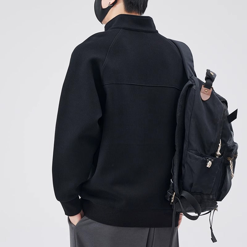 Loose pullover with stand-up collar and zipper