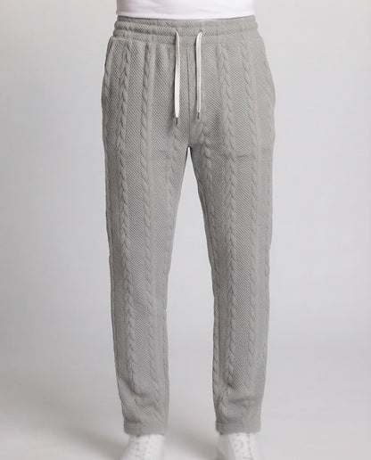 Men's loosely cut knitted jogging pants with cable pattern Shop Velvia