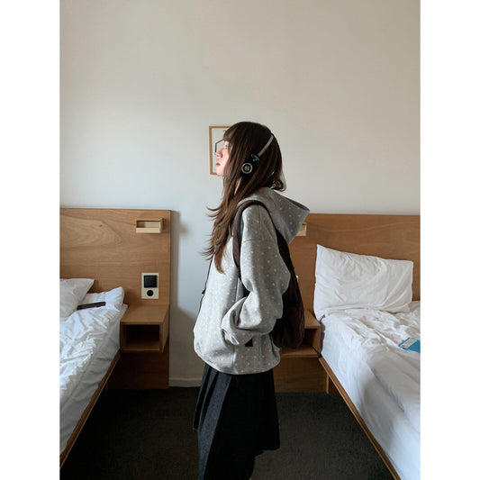 Hooded sweatshirt with star pattern and zipper