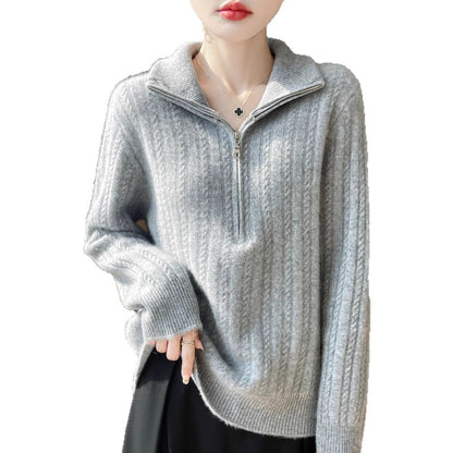 Women's wool sweater with cable pattern and half zipper