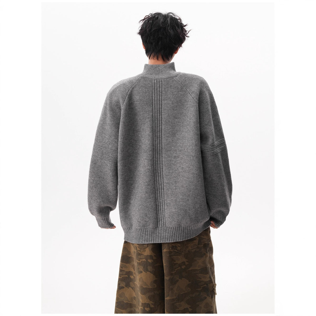 Unisex knitted pullover with stand-up collar and zipper