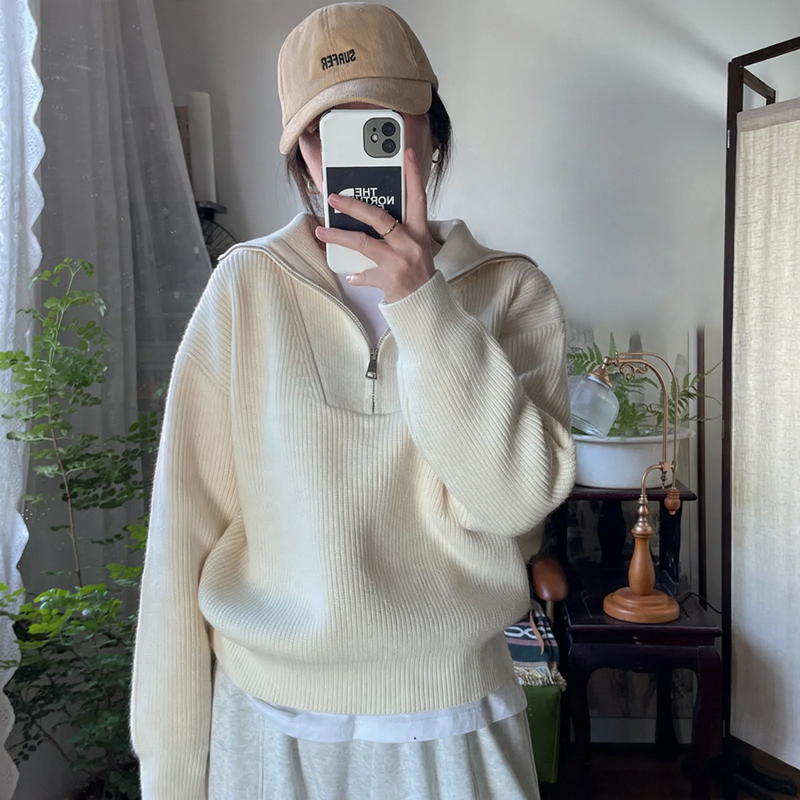 Women's knitted pullover with zipper and rib knit