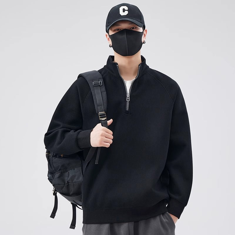 Loose pullover with stand-up collar and zipper