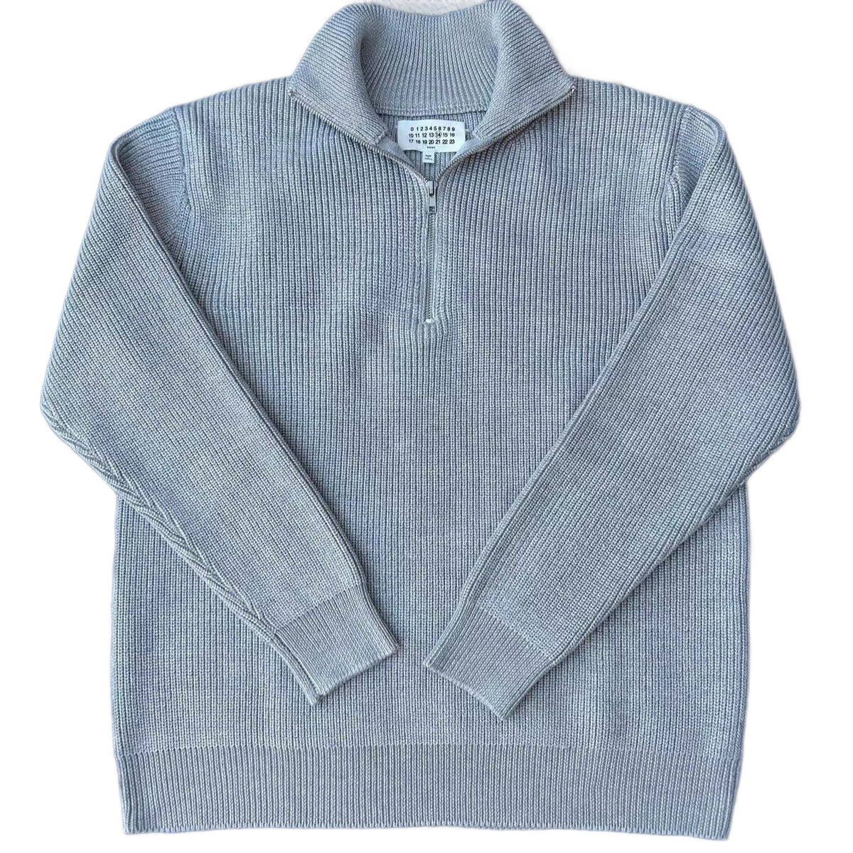 Stylish knitted sweater with zipper