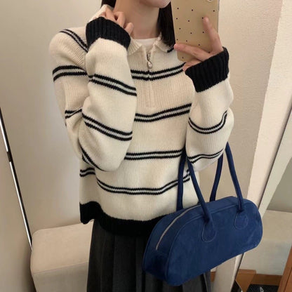 Women's sweater with zipper and stripe pattern