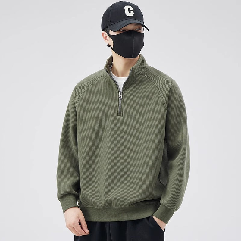 Loose pullover with stand-up collar and zipper