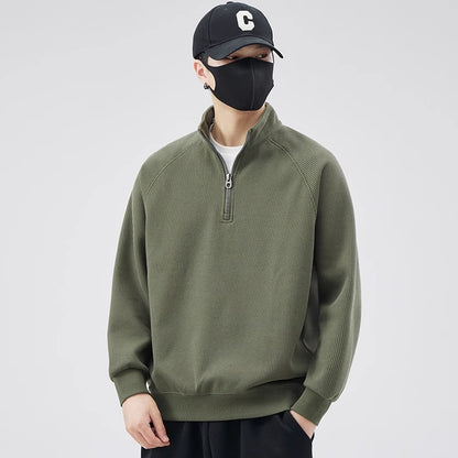 Loose pullover with stand-up collar and zipper