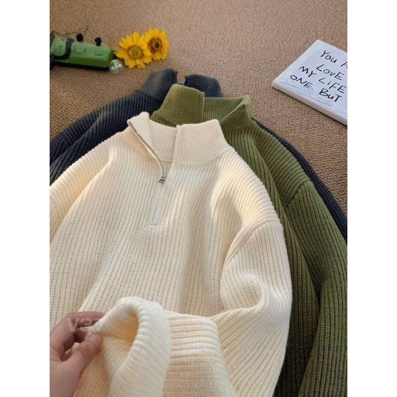 Men's knit pullover with zipper and ribbed structure