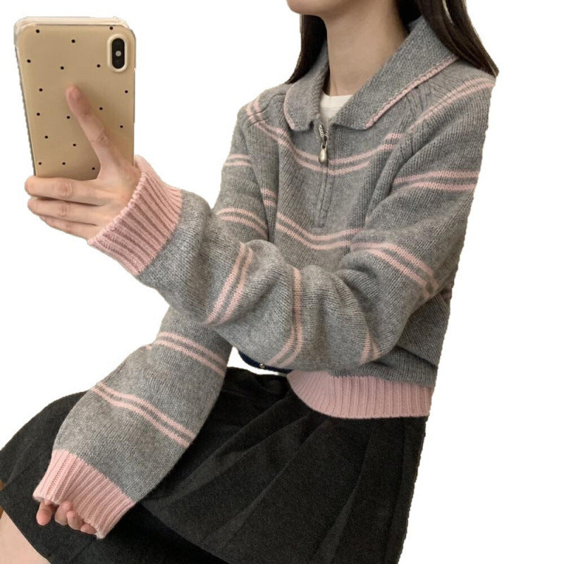 Women's sweater with zipper and stripe pattern