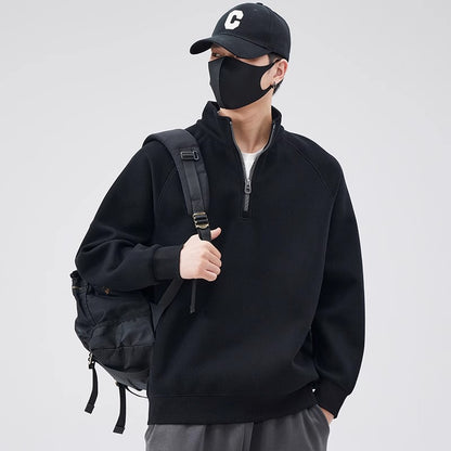 Loose pullover with stand-up collar and zipper