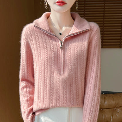Women's wool sweater with cable pattern and half zipper