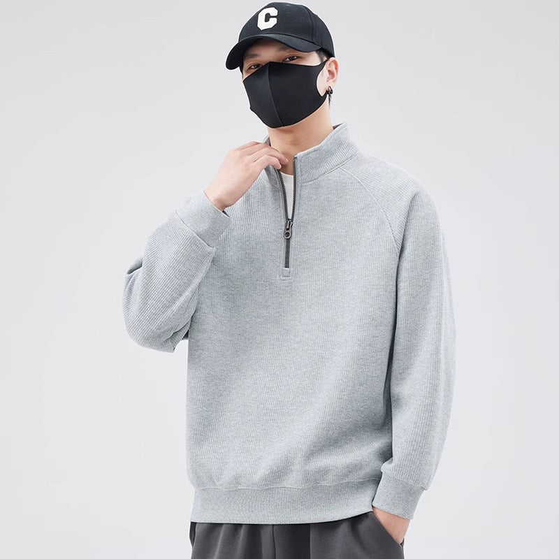 Loose pullover with stand-up collar and zipper