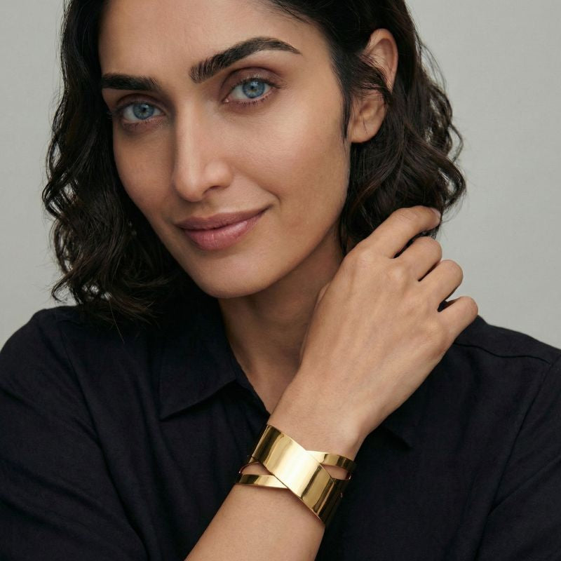 Women's Wide Bangle Bracelet in Gold Look with Crisscross Design