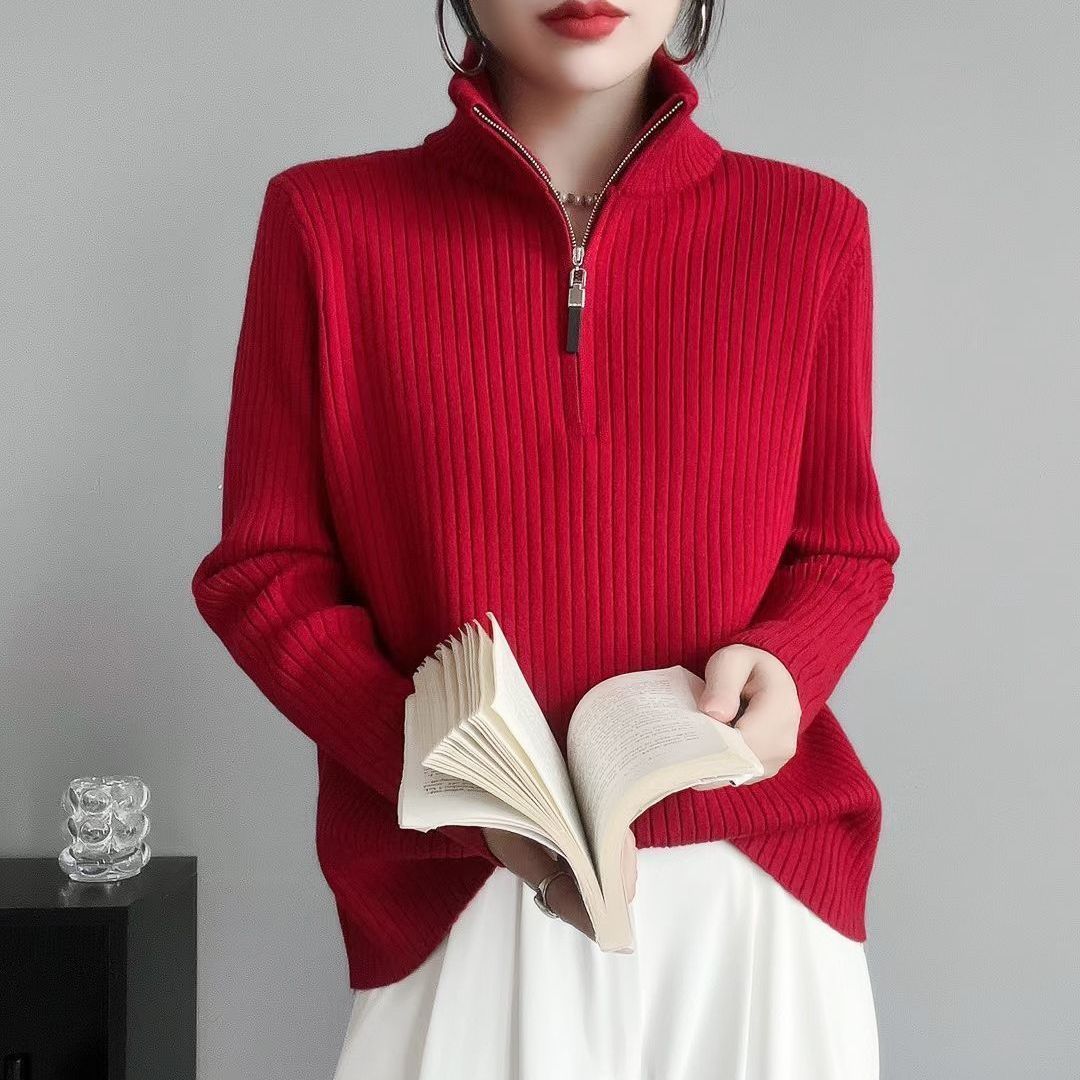 Women's knit sweater with zipper and finger holes