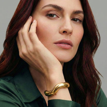 Women Open Bangle with Curved Design in Gold Look