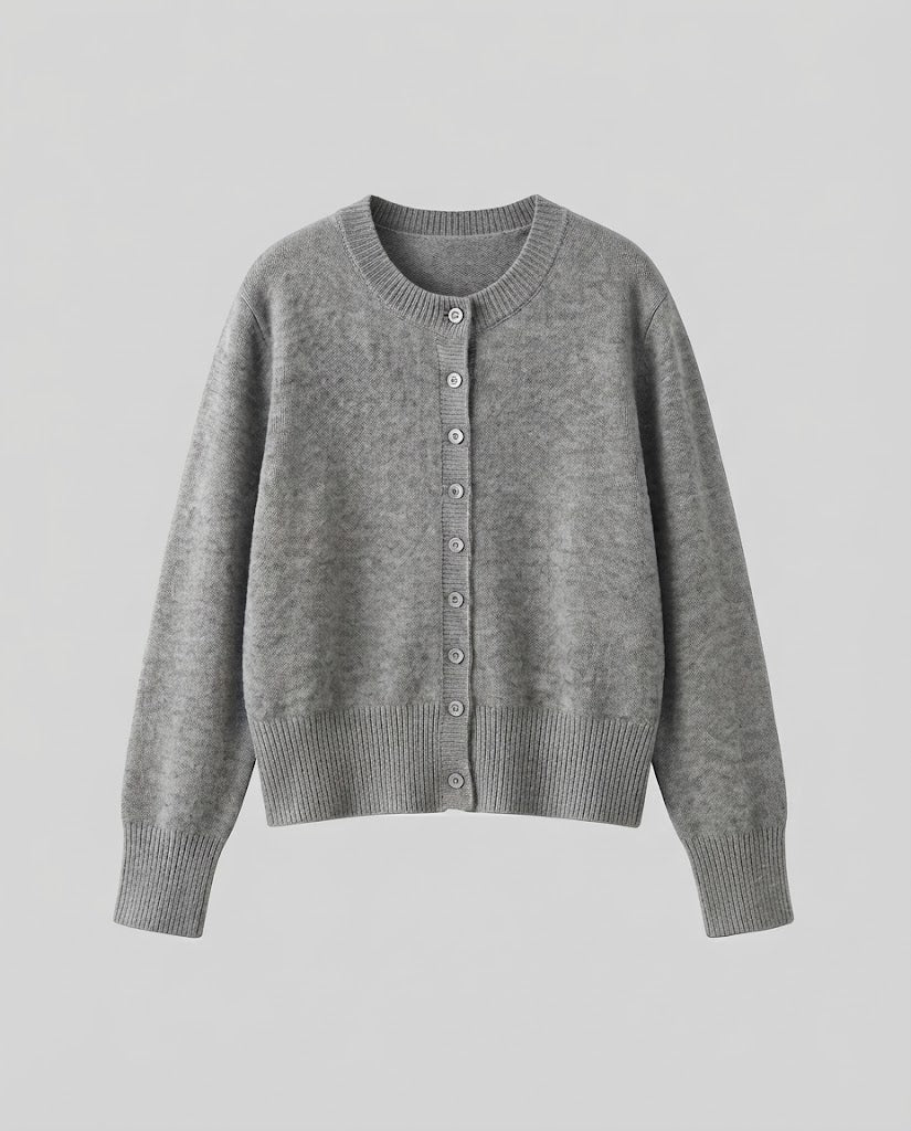 Ladies short-cut fine knit cardigan with ribbed hem and subtle button placket Shop Velvia