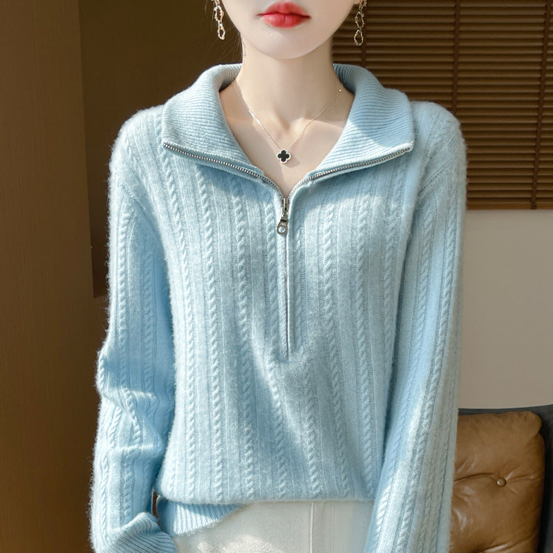 Women's wool sweater with cable pattern and half zipper