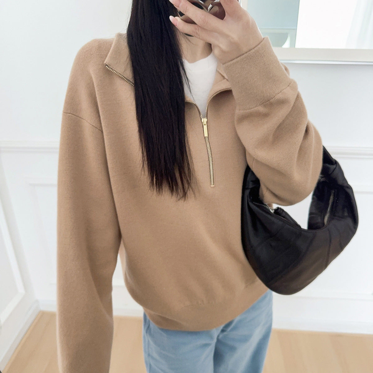 Women's knitted sweater with zipper and stand-up collar