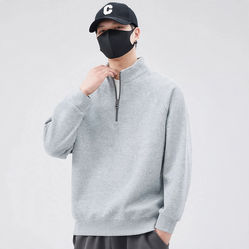 Loose pullover with stand-up collar and zipper