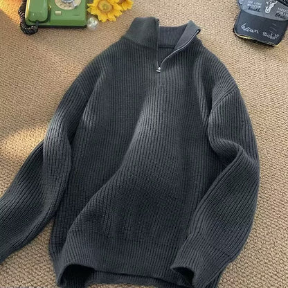 Men's knit pullover with zipper and ribbed structure