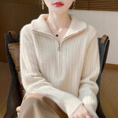 Women's wool sweater with cable pattern and half zipper