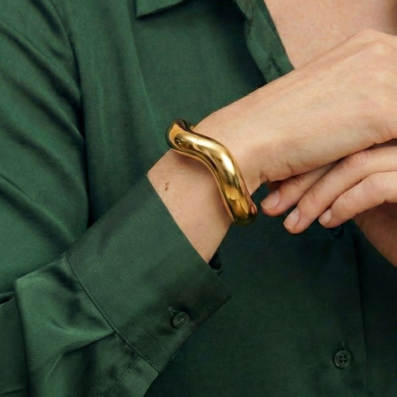 Women Open Bangle with Curved Design in Gold Look