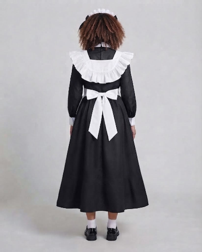 Women's costume dress with ruffle details and elegant accessories Shop Velvia