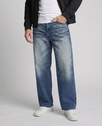 Men's baggy jeans in an extra wide palazzo cut with distinctive whisker and ombre fade Shop Velvia