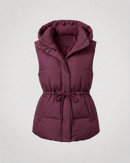 Women's quilted hooded vest with waist drawstring, padded thermal filling, and generous side pockets