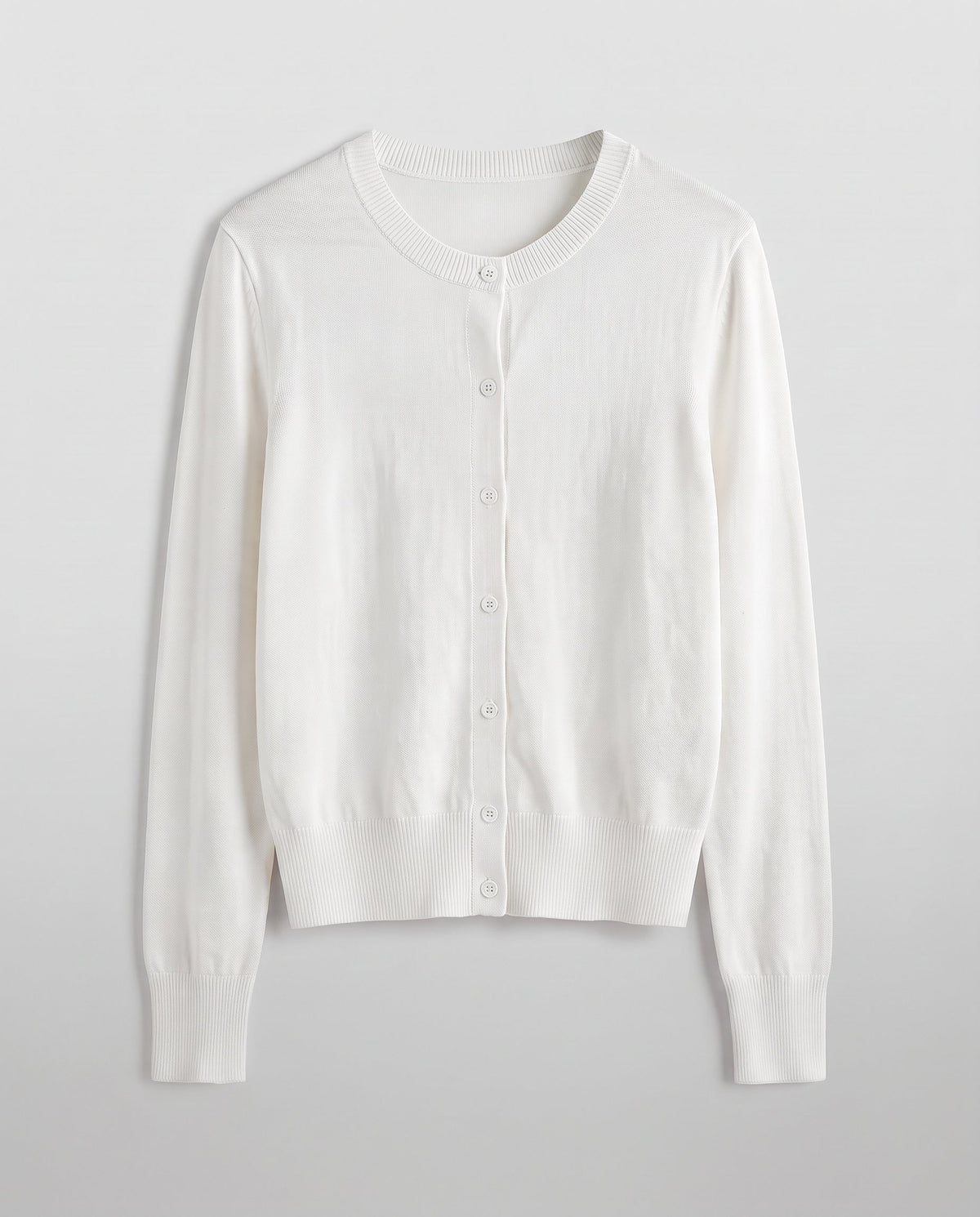 Women's lightweight fine-knit cardigan with round neckline, slim silhouette, and extra-long cuffs Shop Velvia