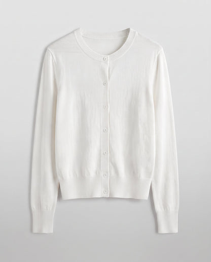 Women's lightweight fine-knit cardigan with round neckline, slim silhouette, and extra-long cuffs Shop Velvia