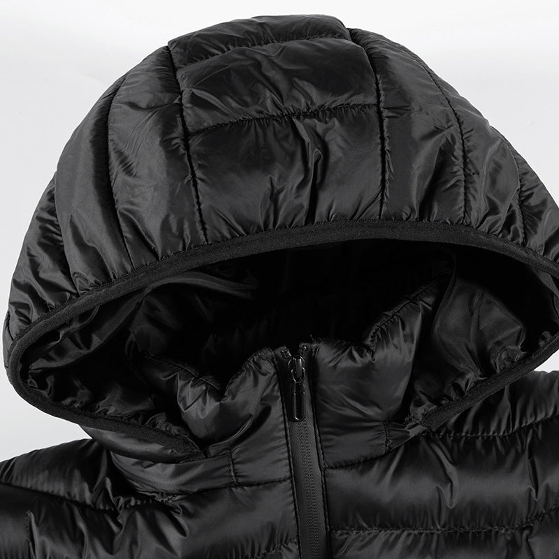 Men's ultralight quilted down jacket with hood, wind-resistant outer shell and packing function Shop Velvia