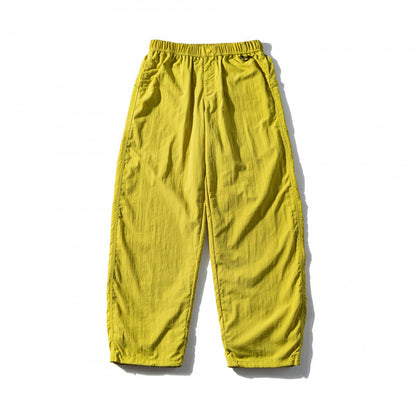 Unisex Loose Crinkle Pants with elastic drawstring waistband, drop-crotch, and side pockets Shop Velvia