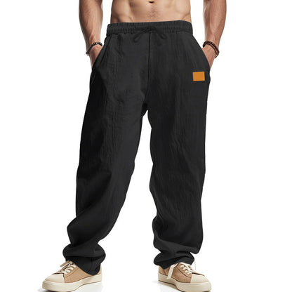 Men's casual linen pants with elastic waistband and generous side pockets Shop Velvia