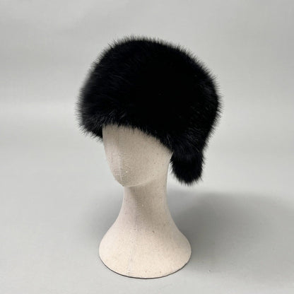 Women’s plush faux fur trapper hat with earflaps and decorative tail Shop Velvia