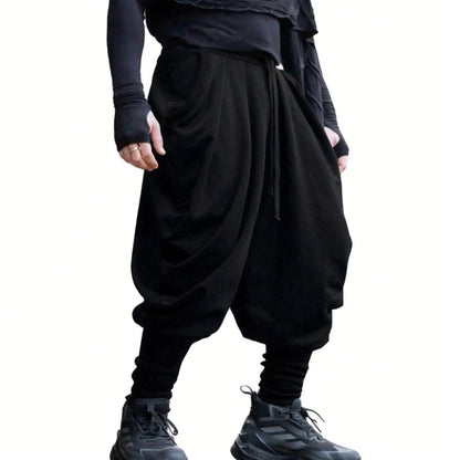 Men's nan avant-garde harem pants with wrap front, elastic waistband, and slim lower leg Shop Velvia