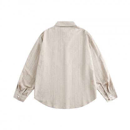 Unisex Oversize striped shirt with chest pocket and rounded hem Shop Velvia