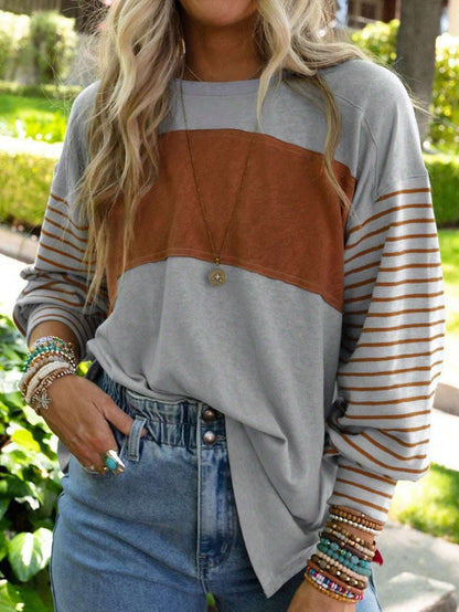 Women's Loose Colorblock Sweatshirt with Striped Sleeves and Round Neck Shop Velvia