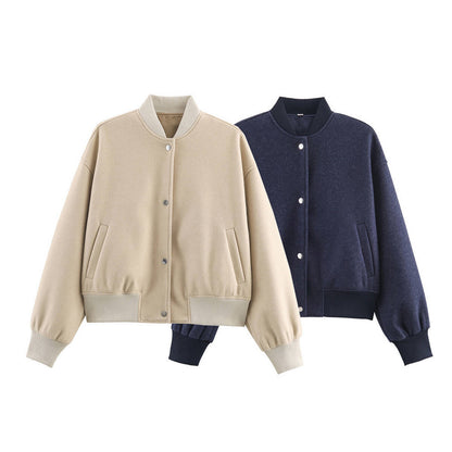 Ladies short boxy bomber jacket with ribbed collar, snap button closure, and pockets Shop Velvia