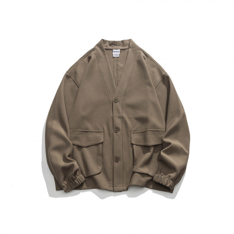 Unisex Oversize cardigan with large flap pockets and waffle texture Shop Velvia