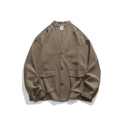 Unisex Oversize cardigan with large flap pockets and waffle texture Shop Velvia