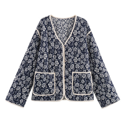Ladies quilted jacket with floral allover, V-neck, contrast piping and patch pockets Shop Velvia