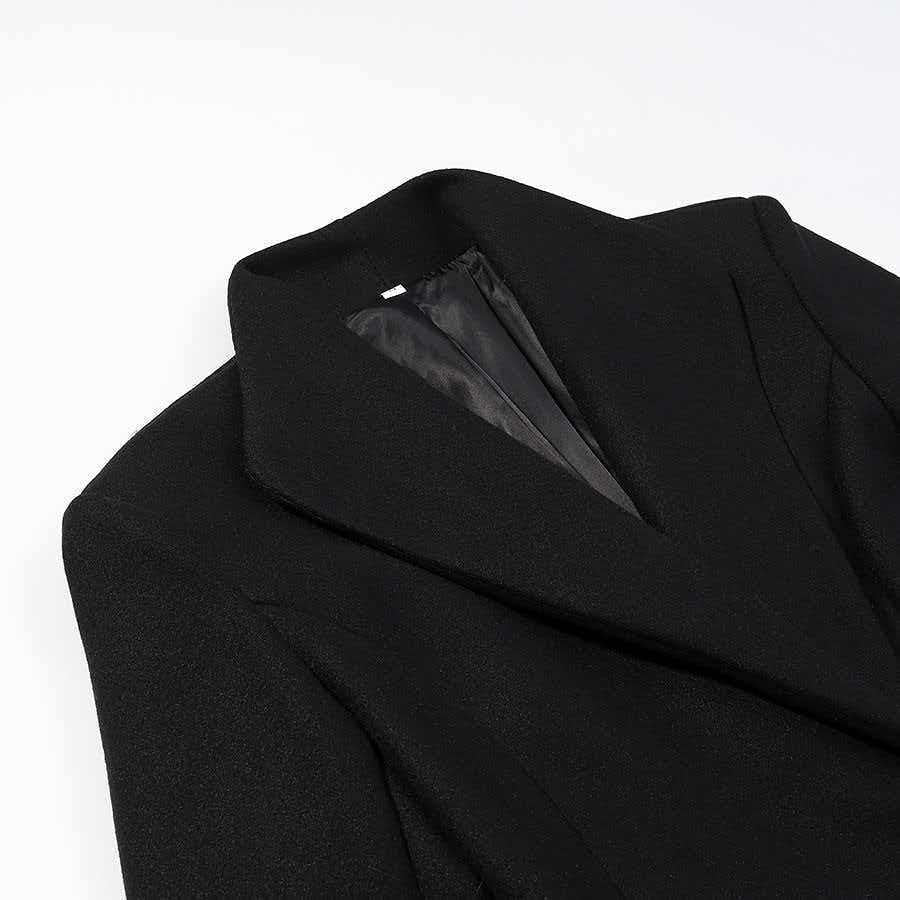 Women Tailored Long Coat with distinctive shoulder pads and asymmetric lapel Shop Velvia