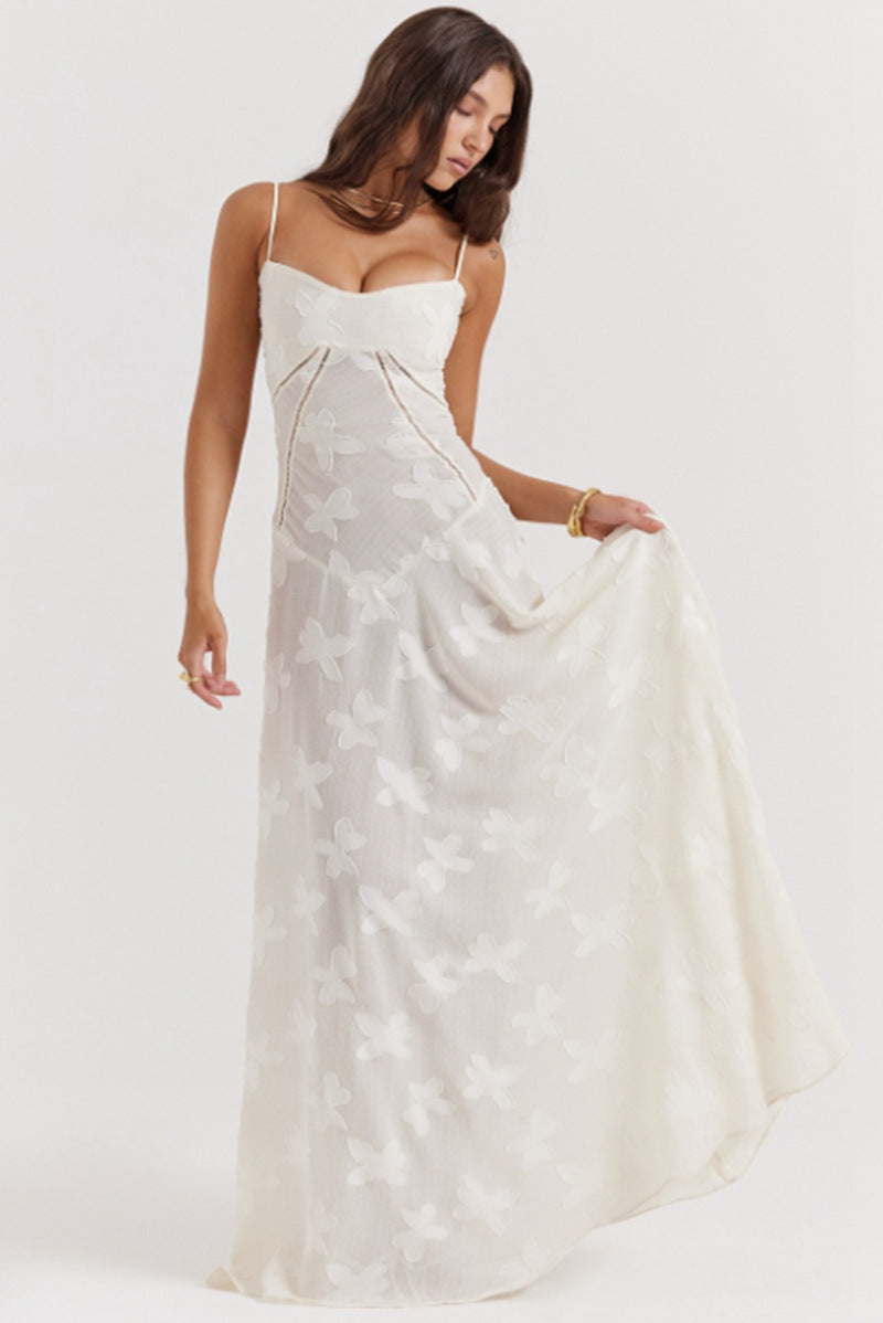 Women's figure-hugging maxi dress with bodice construction and spaghetti straps